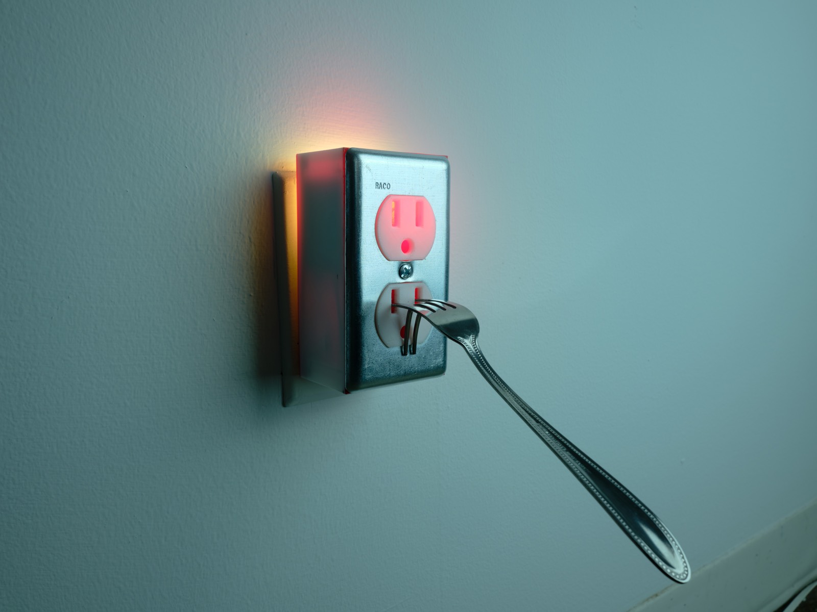 Shocking — glowing red from the side